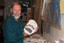 Jim Halfpenny with plaster cast of grizzly in Track Museum